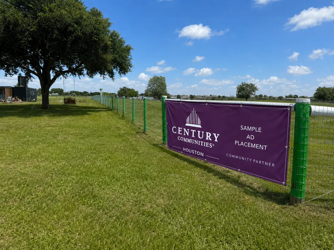 Illustrative Century Communities fence advertising placement at Big Prayer Campus