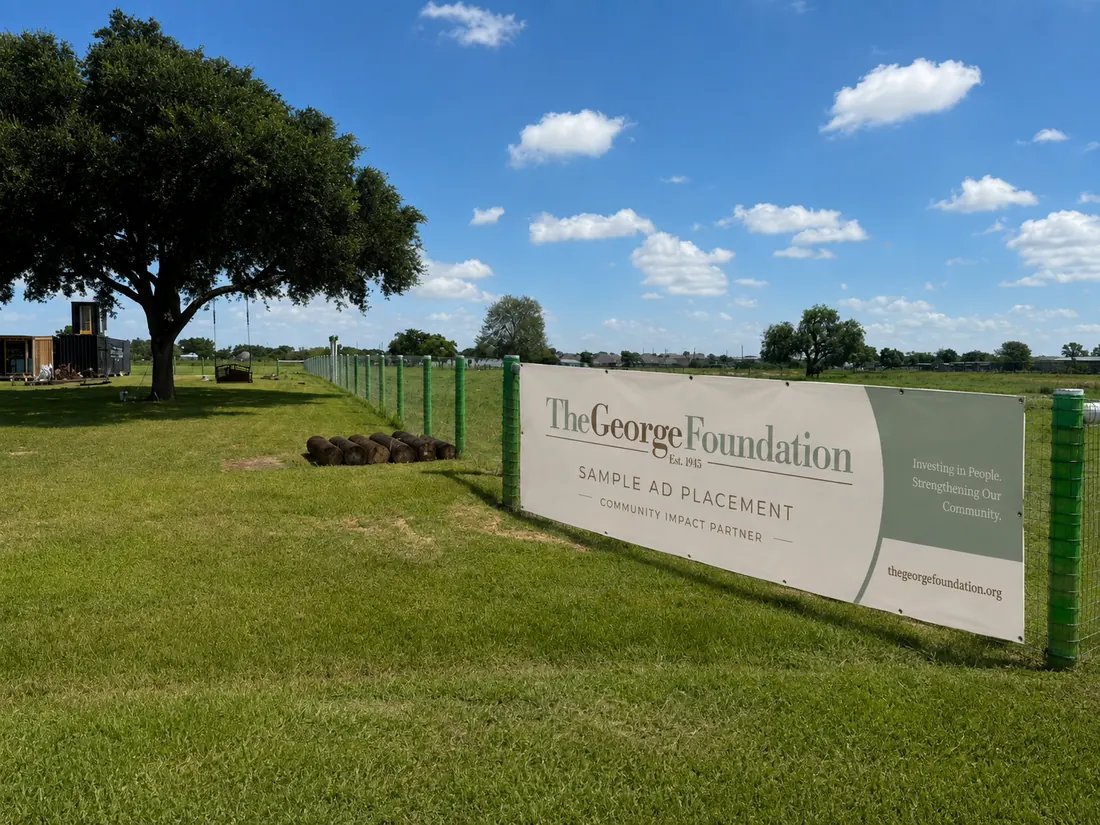 Illustrative The George Foundation fence banner placement at Big Prayer Campus