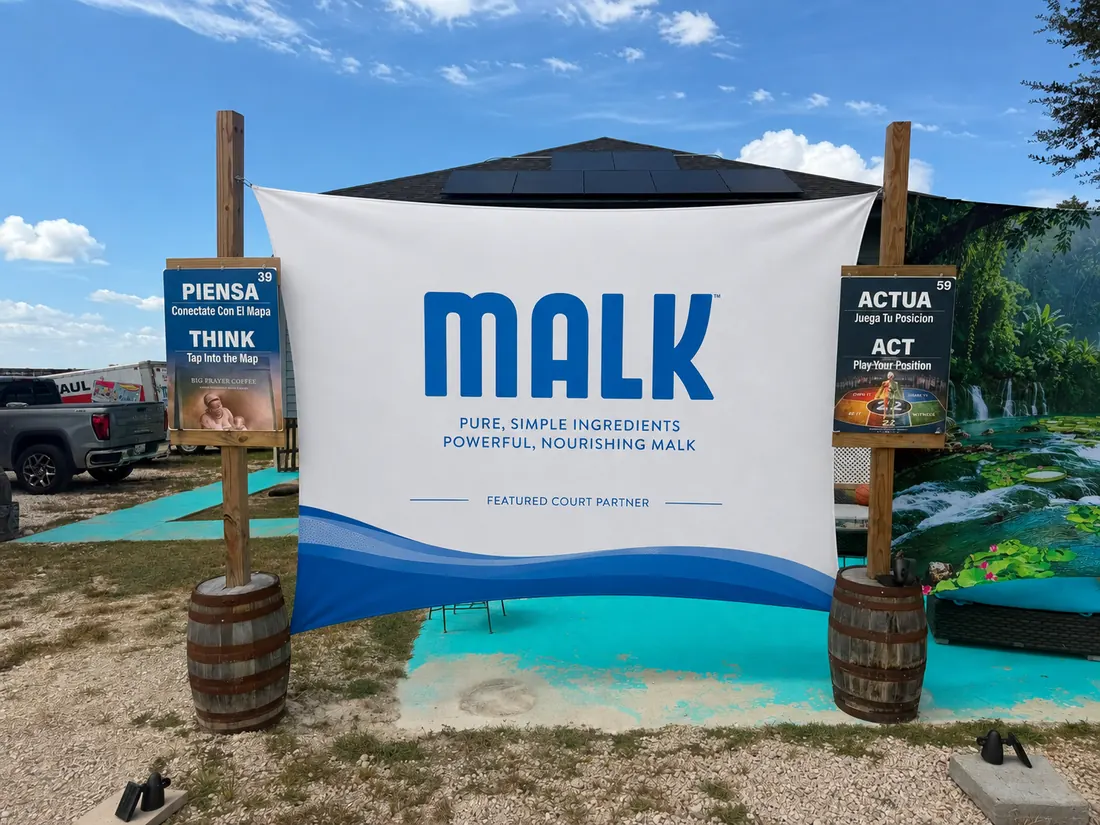 Illustrative Malk large-format outdoor banner placement at Big Prayer Campus