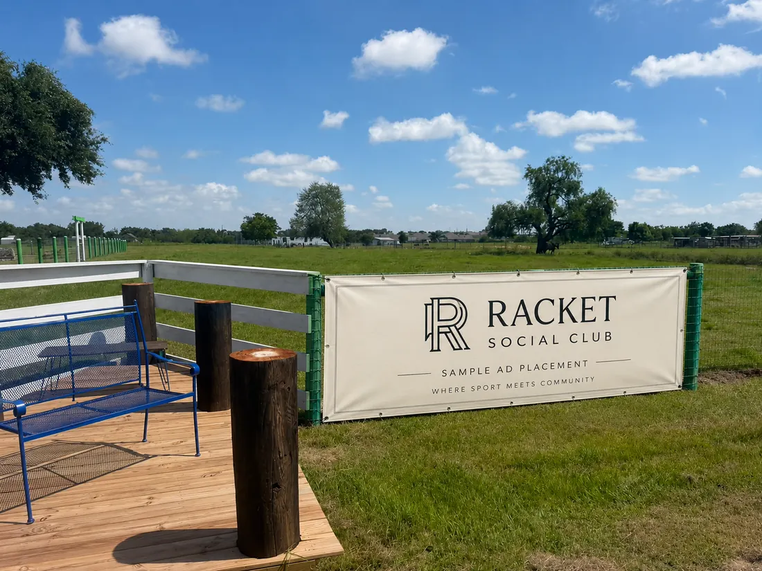 Illustrative Racket Social Club fence advertising placement at Big Prayer Campus