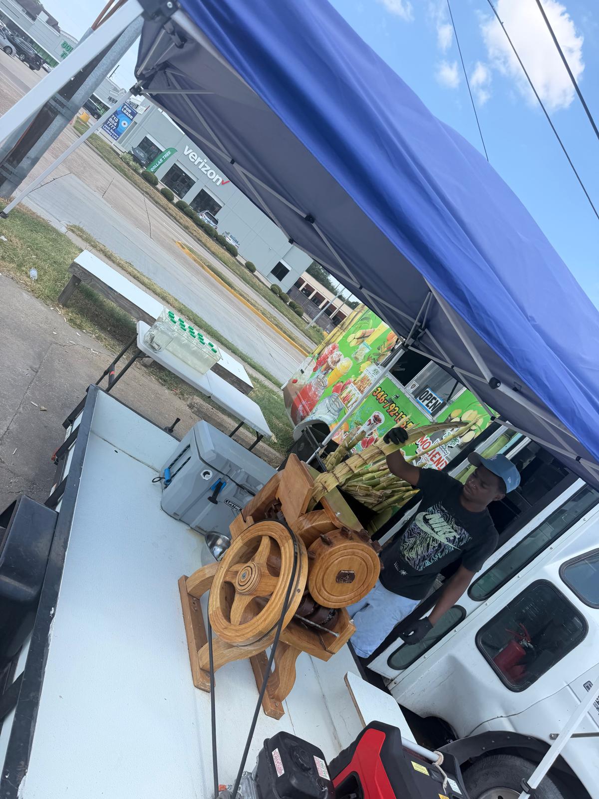Local sugar cane business preparing fresh sugar cane