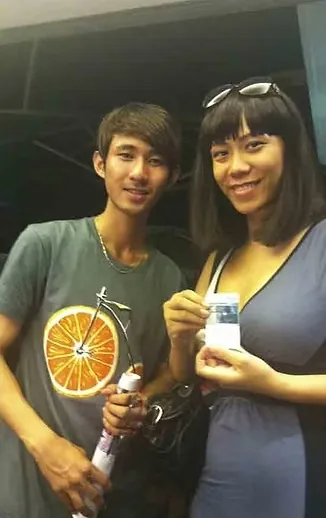 Real photograph from Japan showing two people posing together