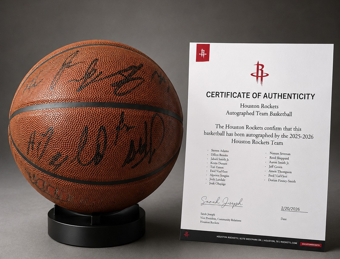 Houston Rockets autographed team basketball displayed with a certificate of authenticity